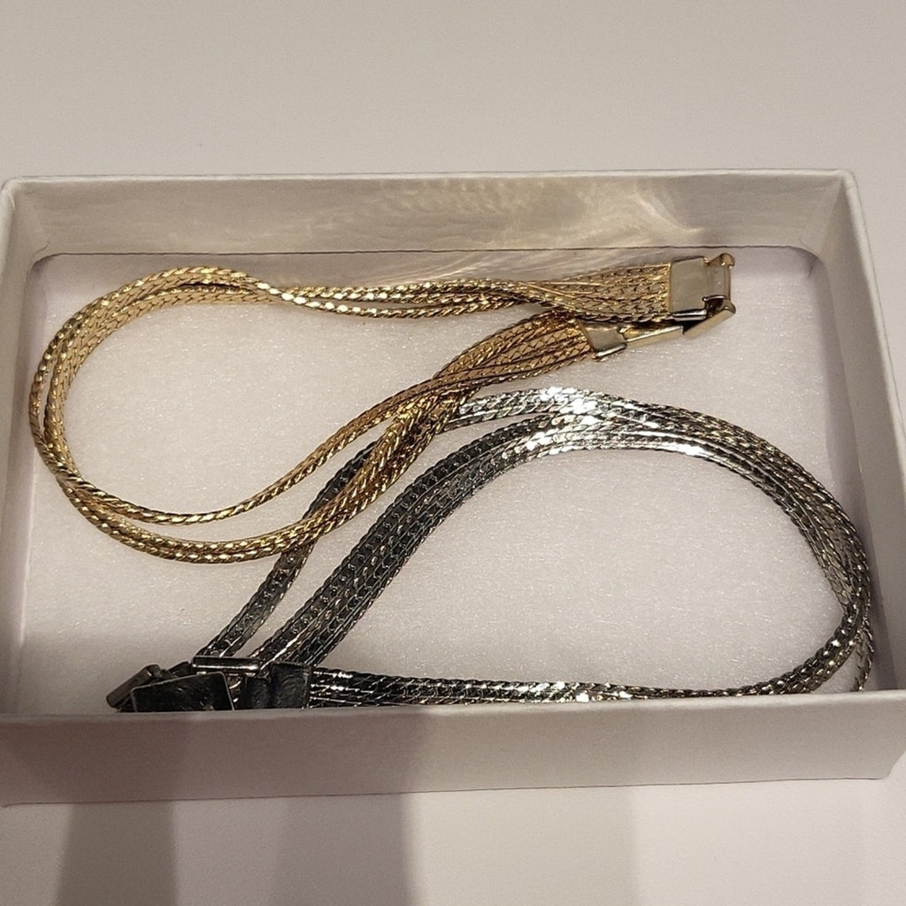 Set of 2 triple strand fashion bracelets in silver and gold